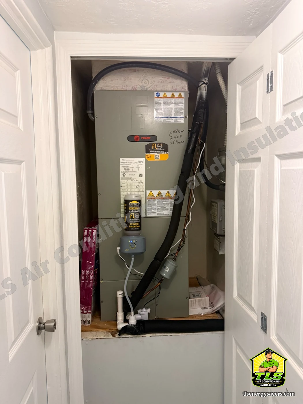 Trane air handler in an indoor closet with an automatic condensate drain line cleaning system fitted, St. Petersburg FL 33713