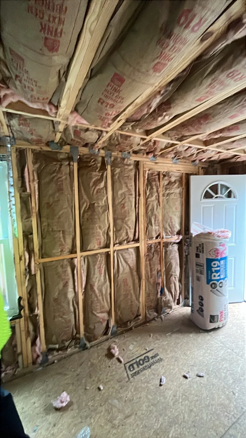 Owens Corning PINK Next Gen R-19 kraft-faced fiberglass batts on site during the insulation install, Tampa FL 33609