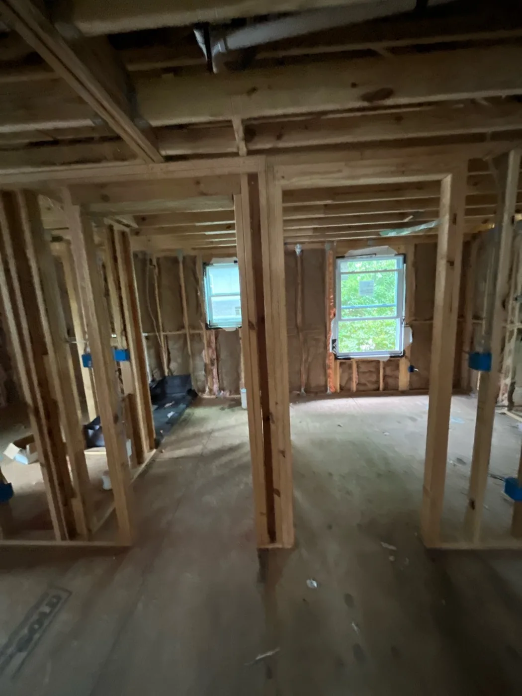 Second-storey rooms stripped back to open 2x4 framing before new insulation went in, Tampa FL 33609