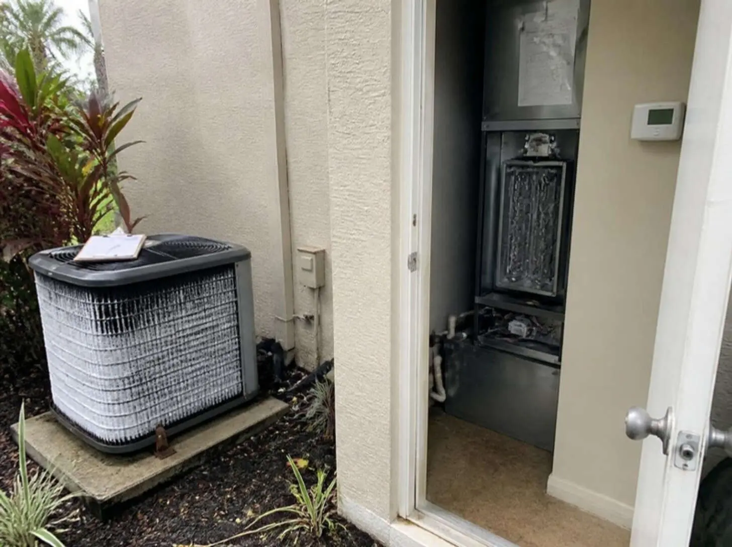 Outdoor unit, indoor air handler and thermostat checked during AC troubleshooting