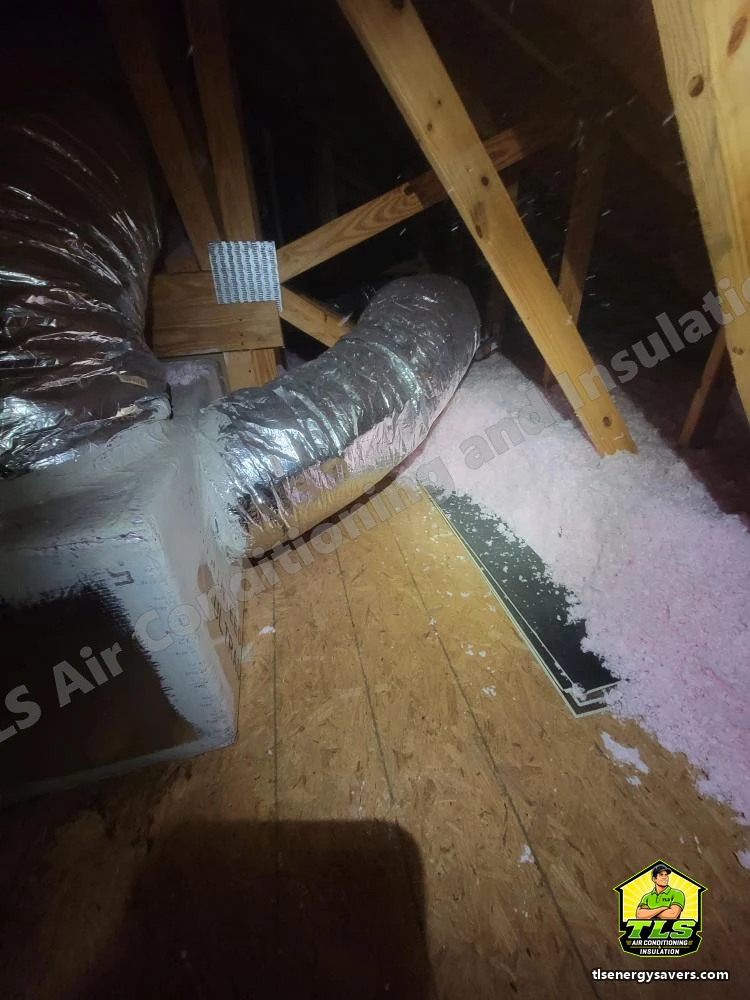 Blown-in fill laid around the flexible duct runs in the attic, Naples FL 34110