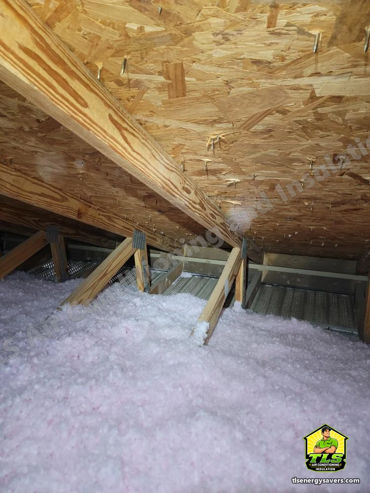 Blown-in coverage carried under the low roof pitch, Naples FL 34110