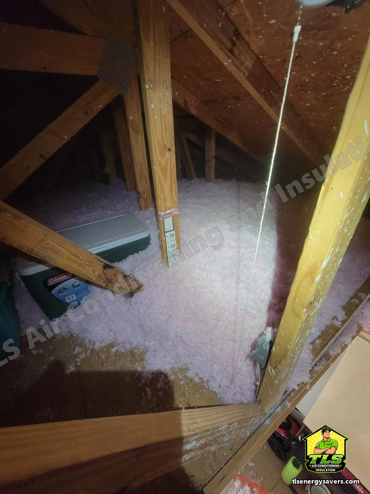 A depth stick standing in the blown-in attic fill near the access, Naples FL 34110