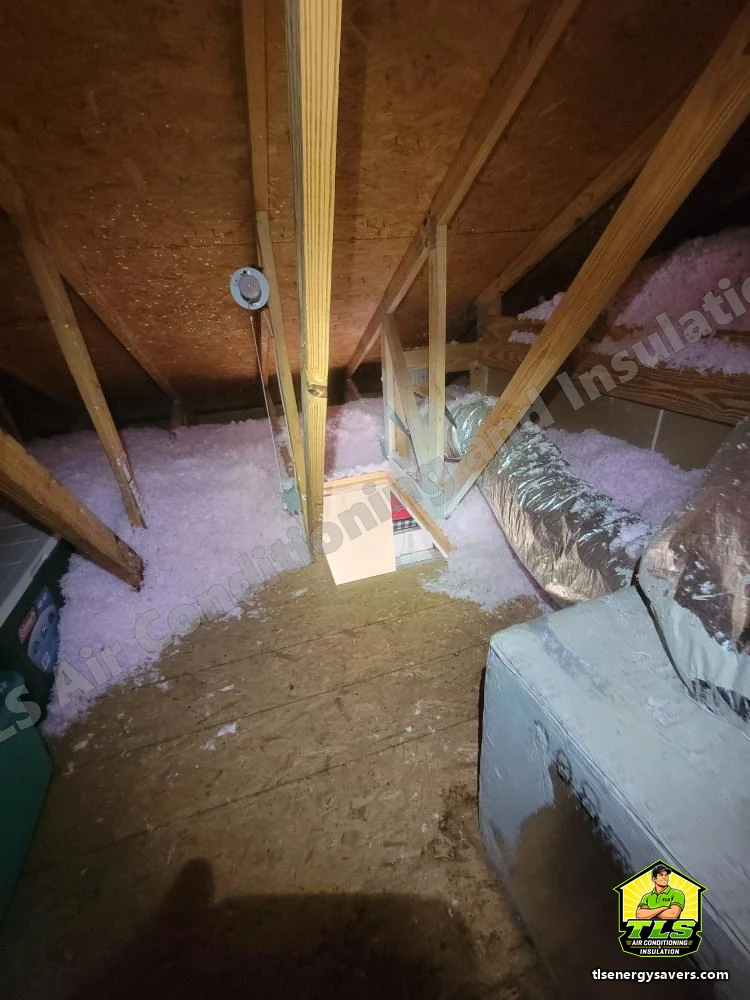 Blown-in insulation stopped cleanly at the edge of the floored storage area, Naples FL 34110