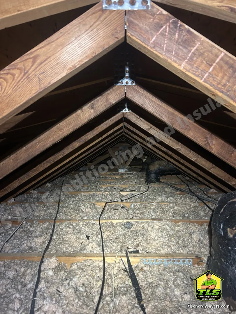 The attic after the blown-in top-up, with even coverage across the joists, Fort Myers FL 33919