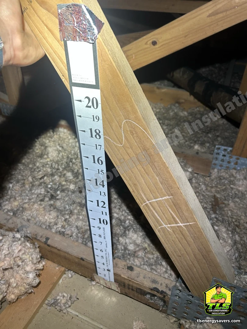 A depth ruler set in the finished blown-in insulation to record the installed level, Fort Myers FL 33919