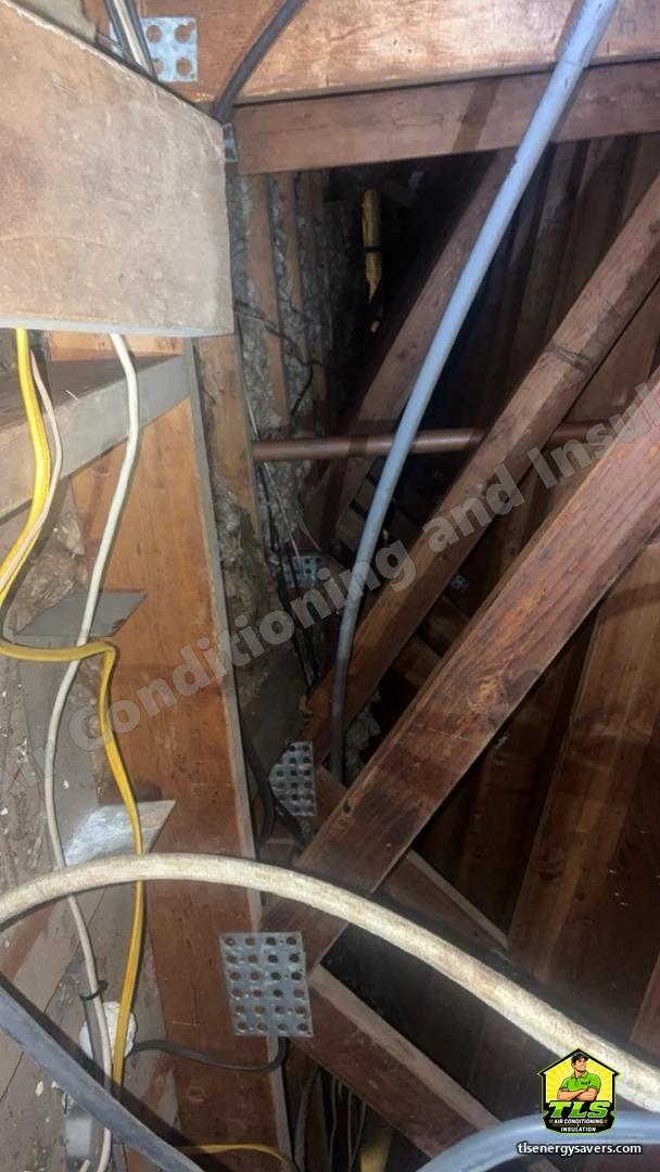 The original attic insulation sitting low around the wiring runs, Fort Myers FL 33919