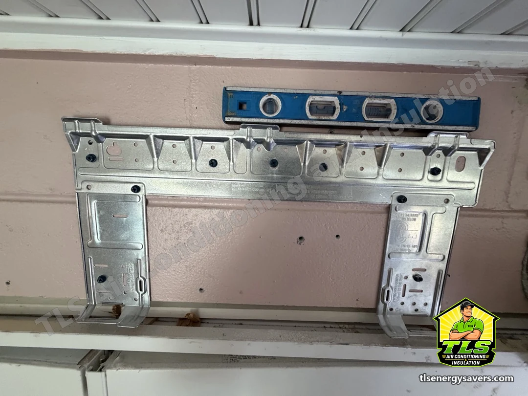 The new indoor unit's wall bracket mounted and checked with a level, Brooksville FL 34601