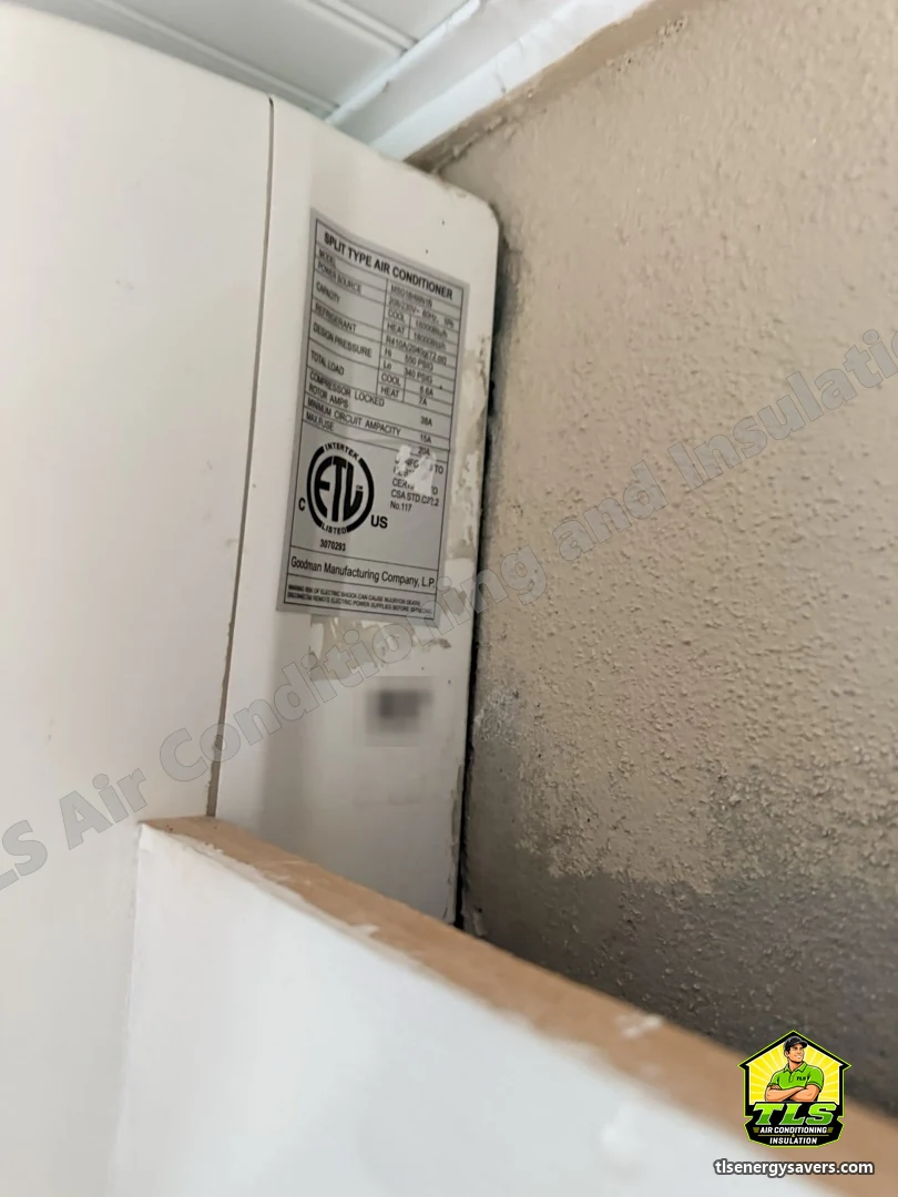 The old Goodman ductless wall unit before removal, with its rating plate weathered, Brooksville FL 34601